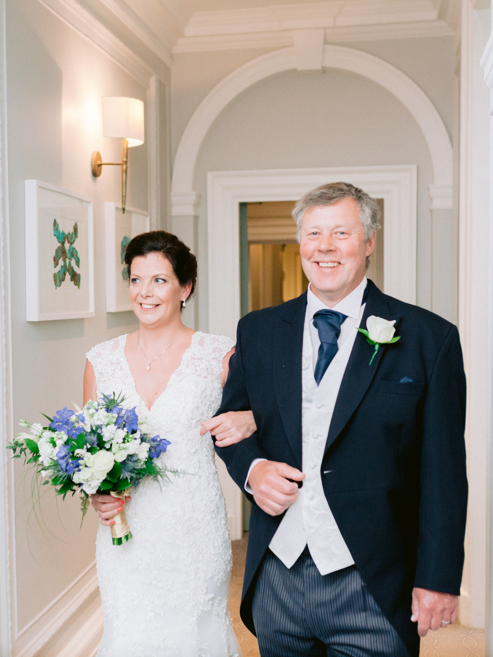 Father of the bride walks his daughter down the aisle of Gorse Hill Manor