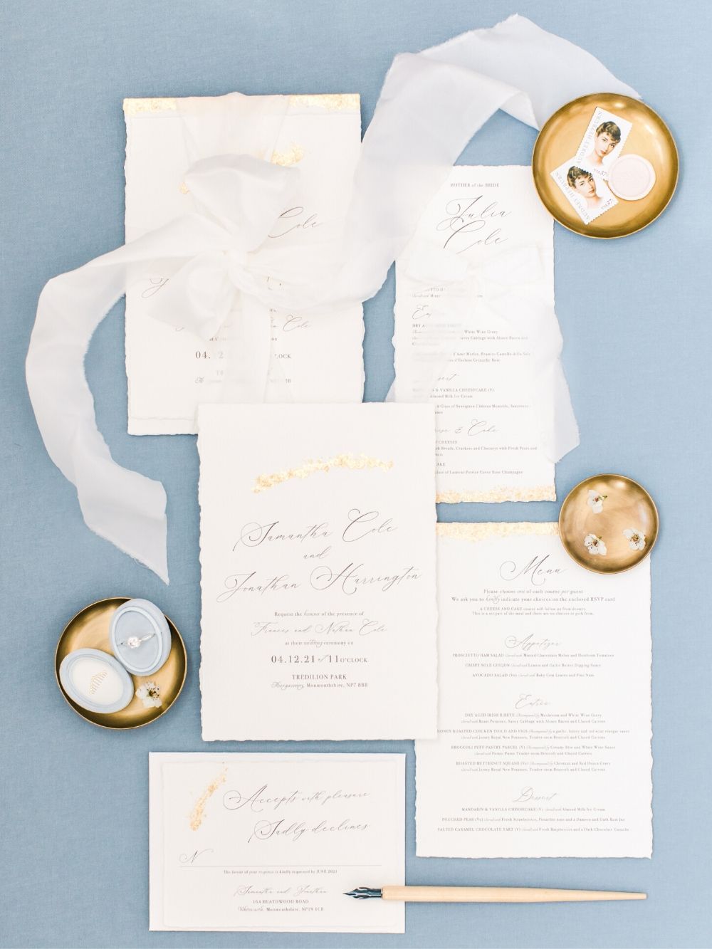 Fine Art Wedding Invitations on a styling board as the bride gets ready
