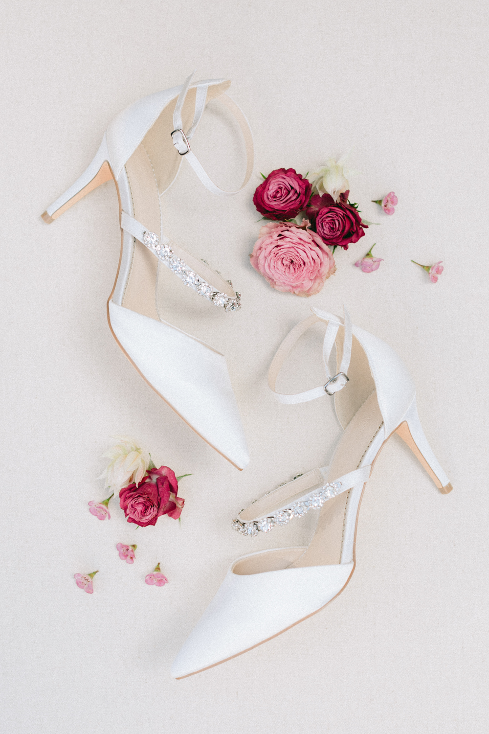 Ivory Wedding shoes with jewels surrounded by pink florals