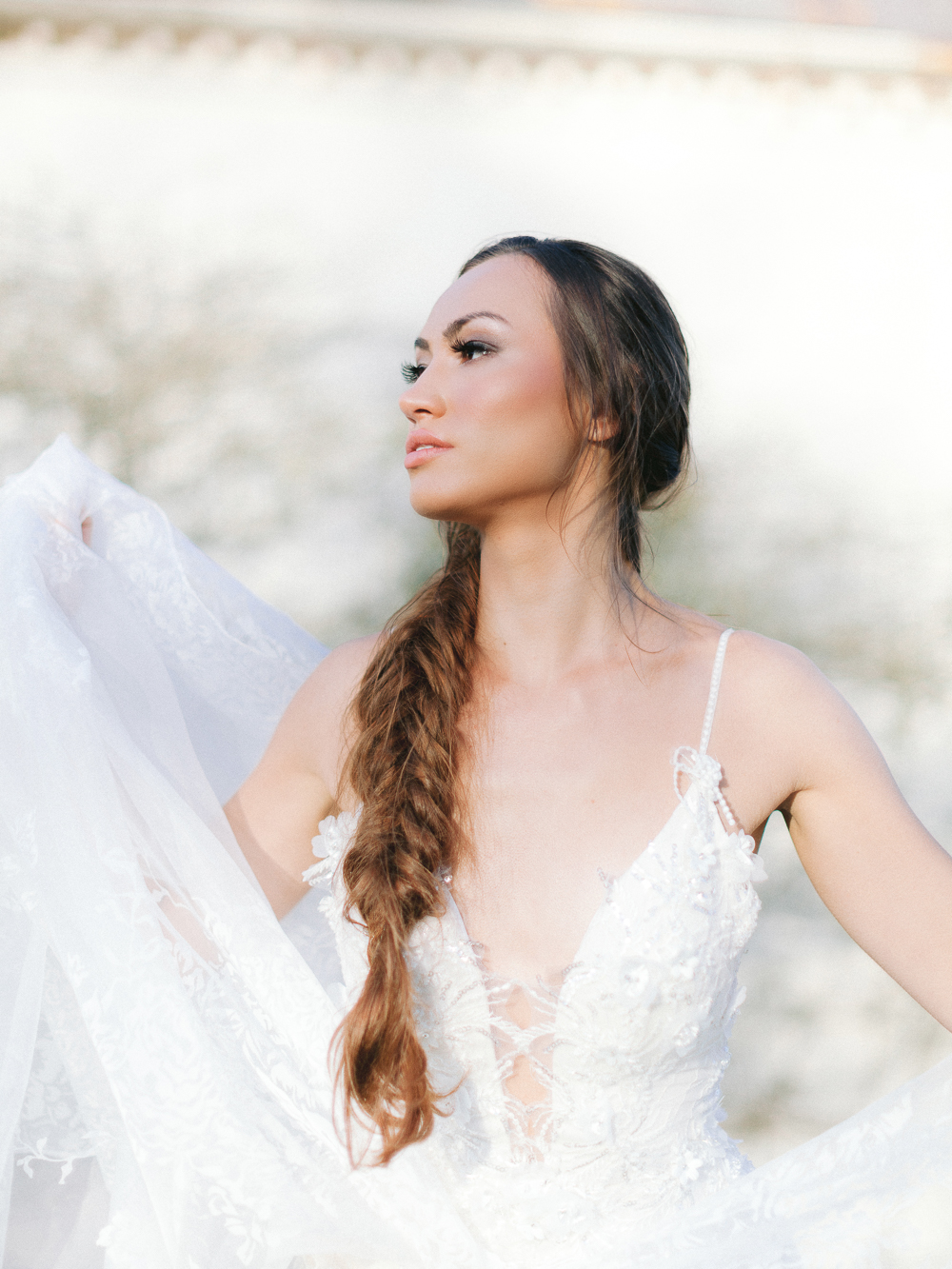 Portrait of oh-so-dreamy wedding dress with delicate lace detail