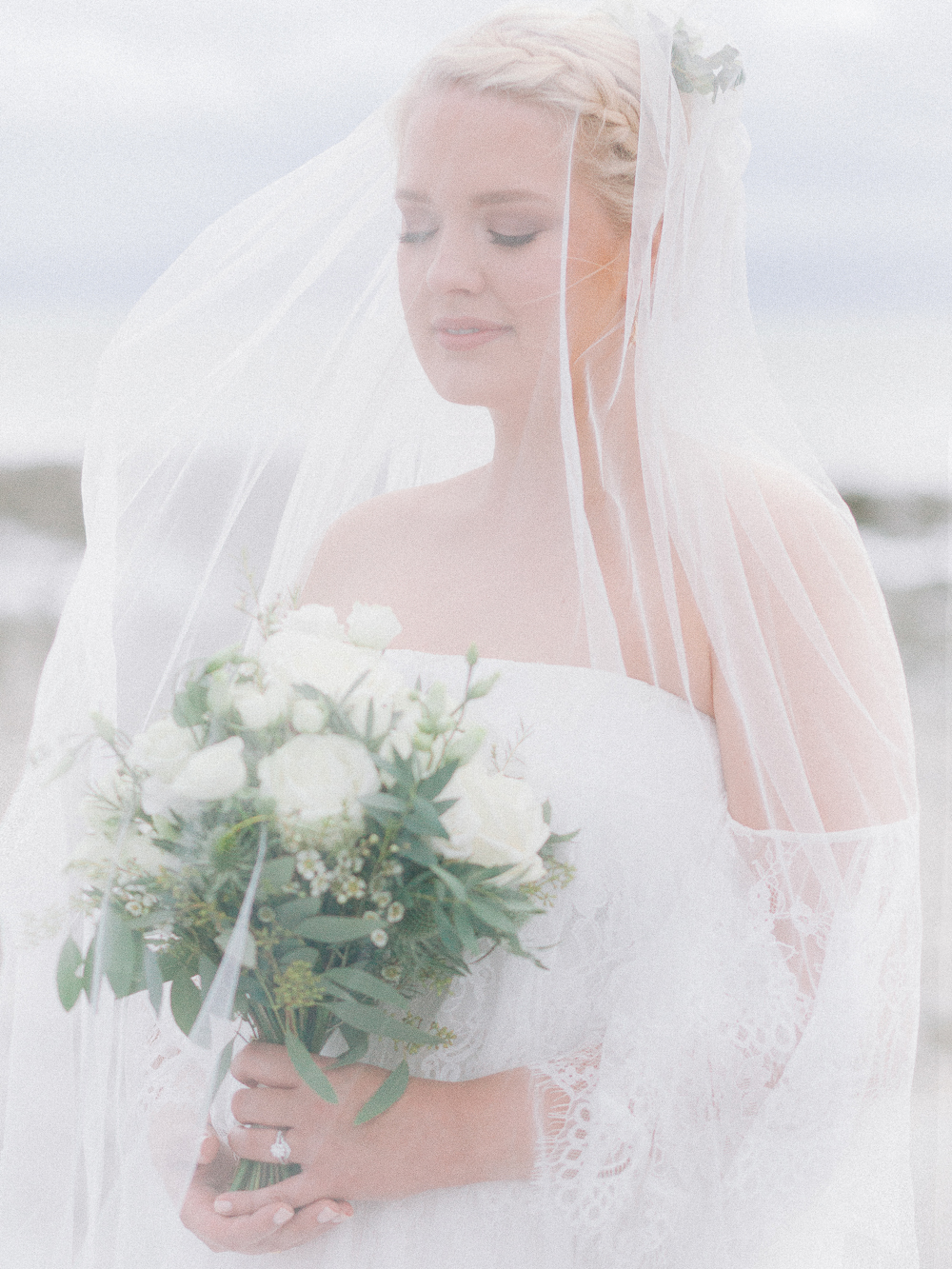 Stunning bridal portrait at Rosedew Farm of bride covered in veil