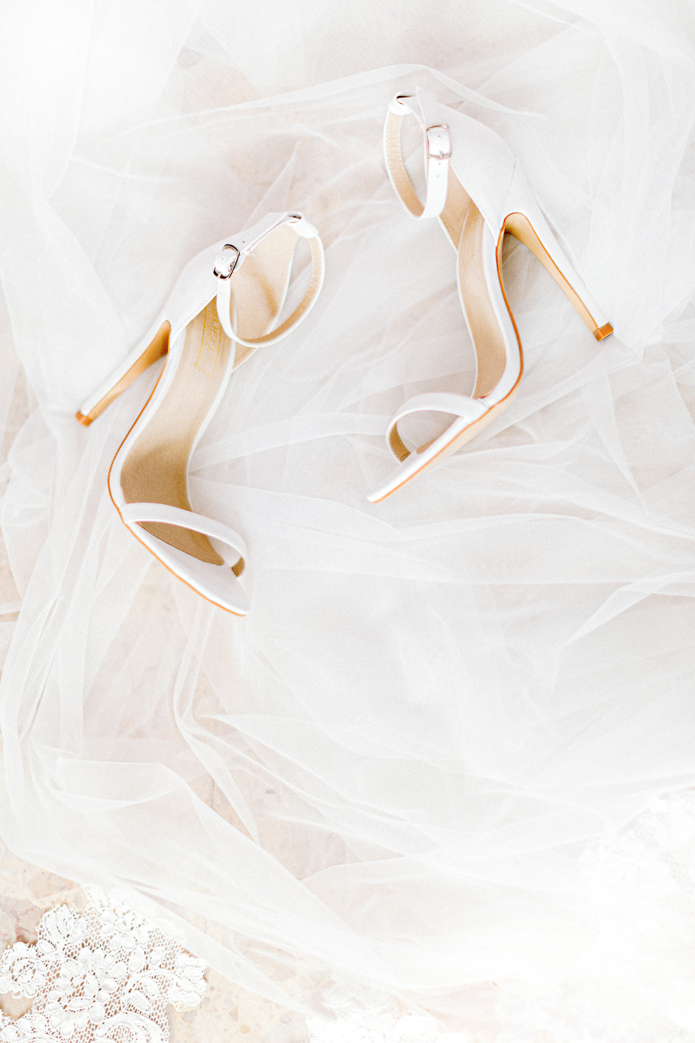 Wedding day bridal details tip shoes with veil image