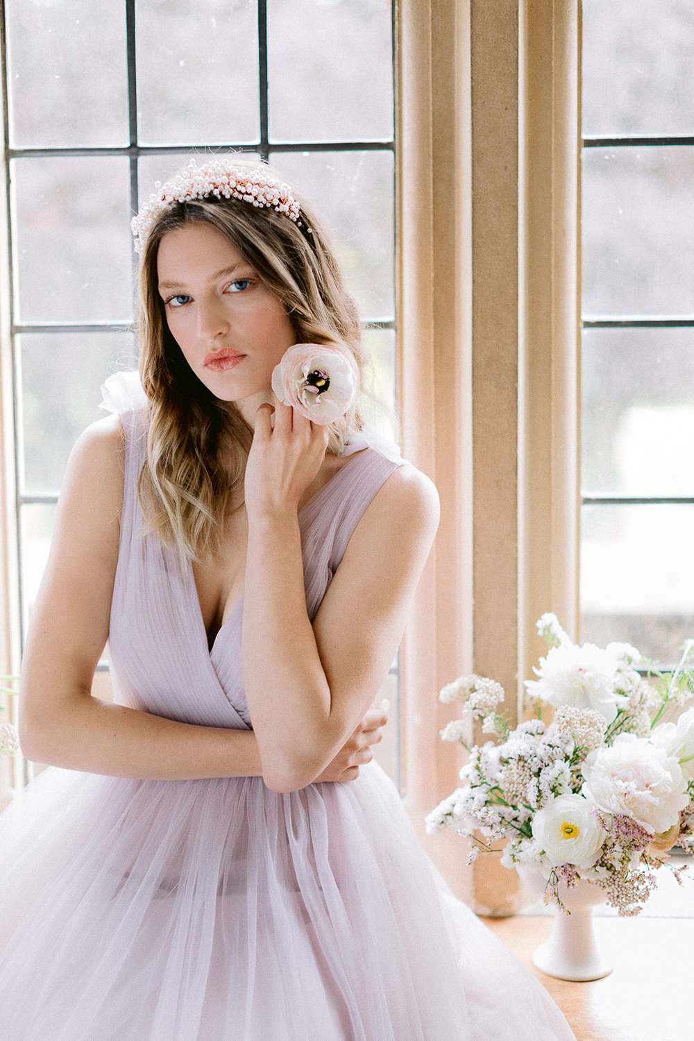 Lilac Blush Fairytale Bridesmaid Gown of Model in Window of Bedroom