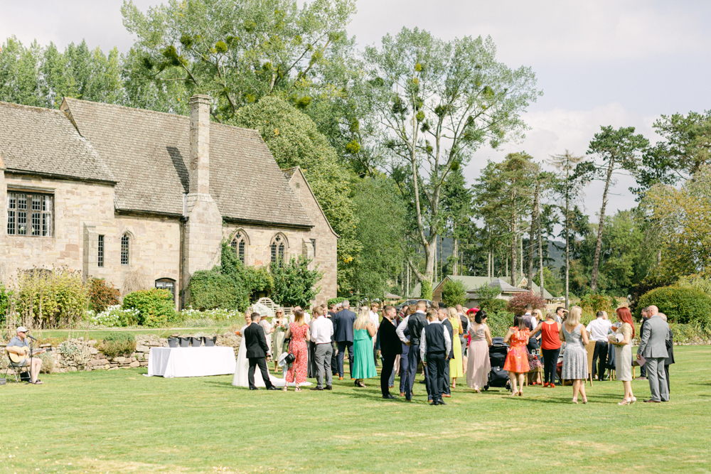 The Romantic venue Brinsop Court near Hereford Guests enjoying the gardens