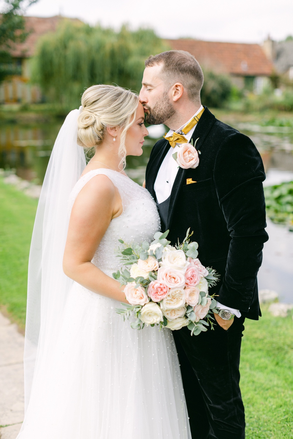 Bride and Groom take romantic stroll at Brinsop Court