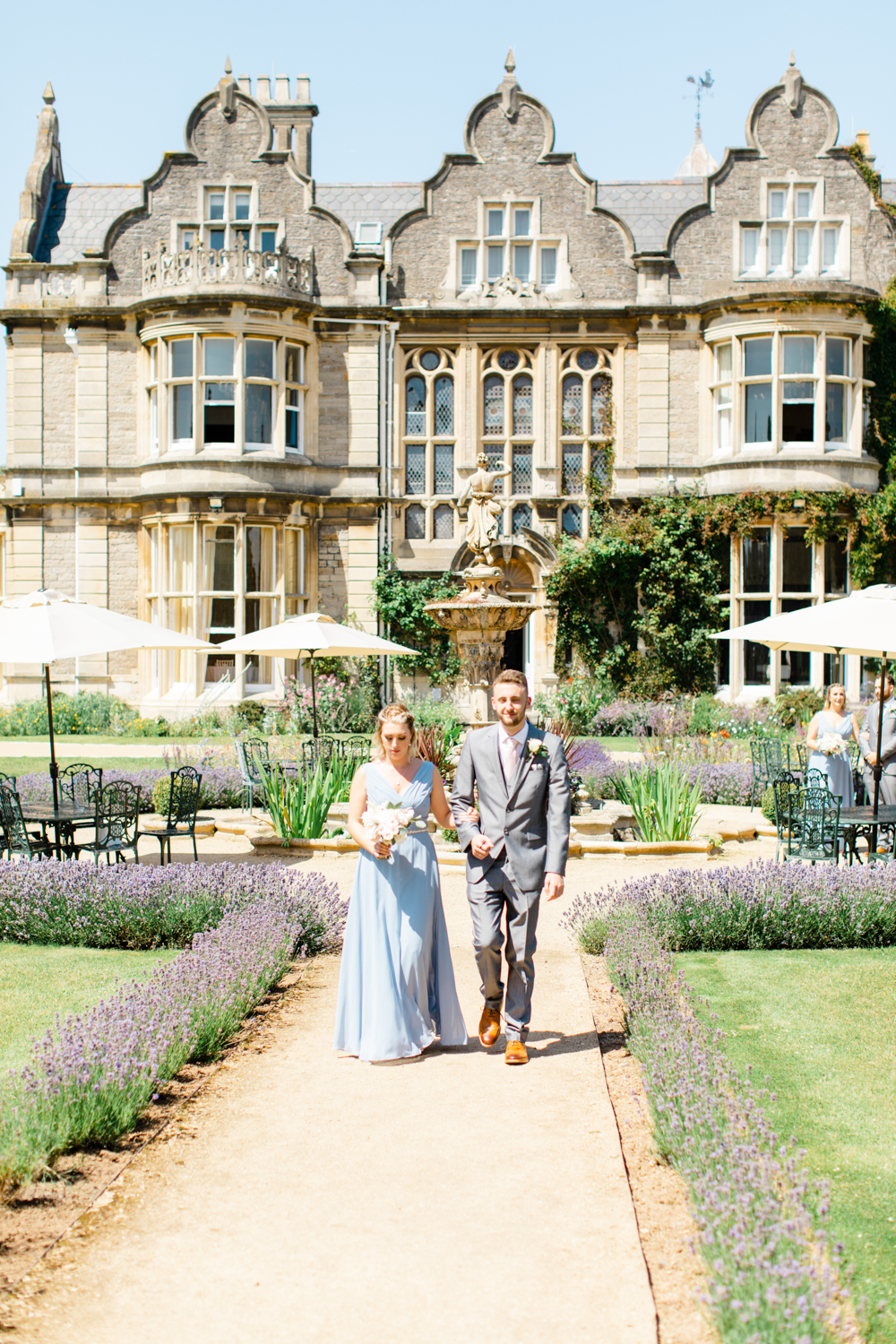 The Magical Clevedon Hall Mansion stands in the backdrop of the wedding party