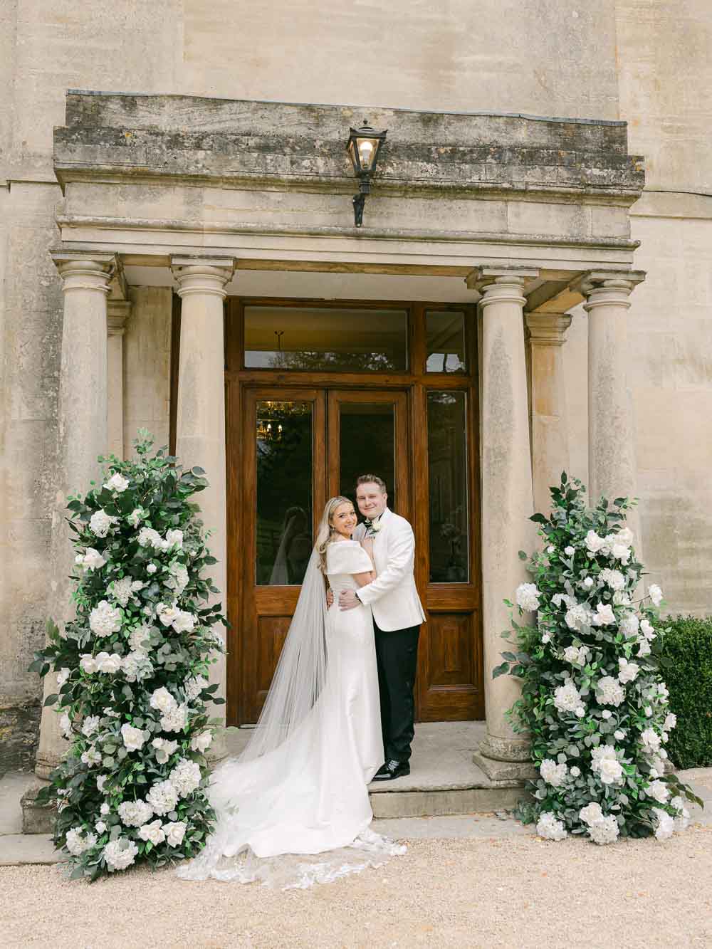 Eastington Park Garden Room set for spring wedding reception with soft florals and natural light.