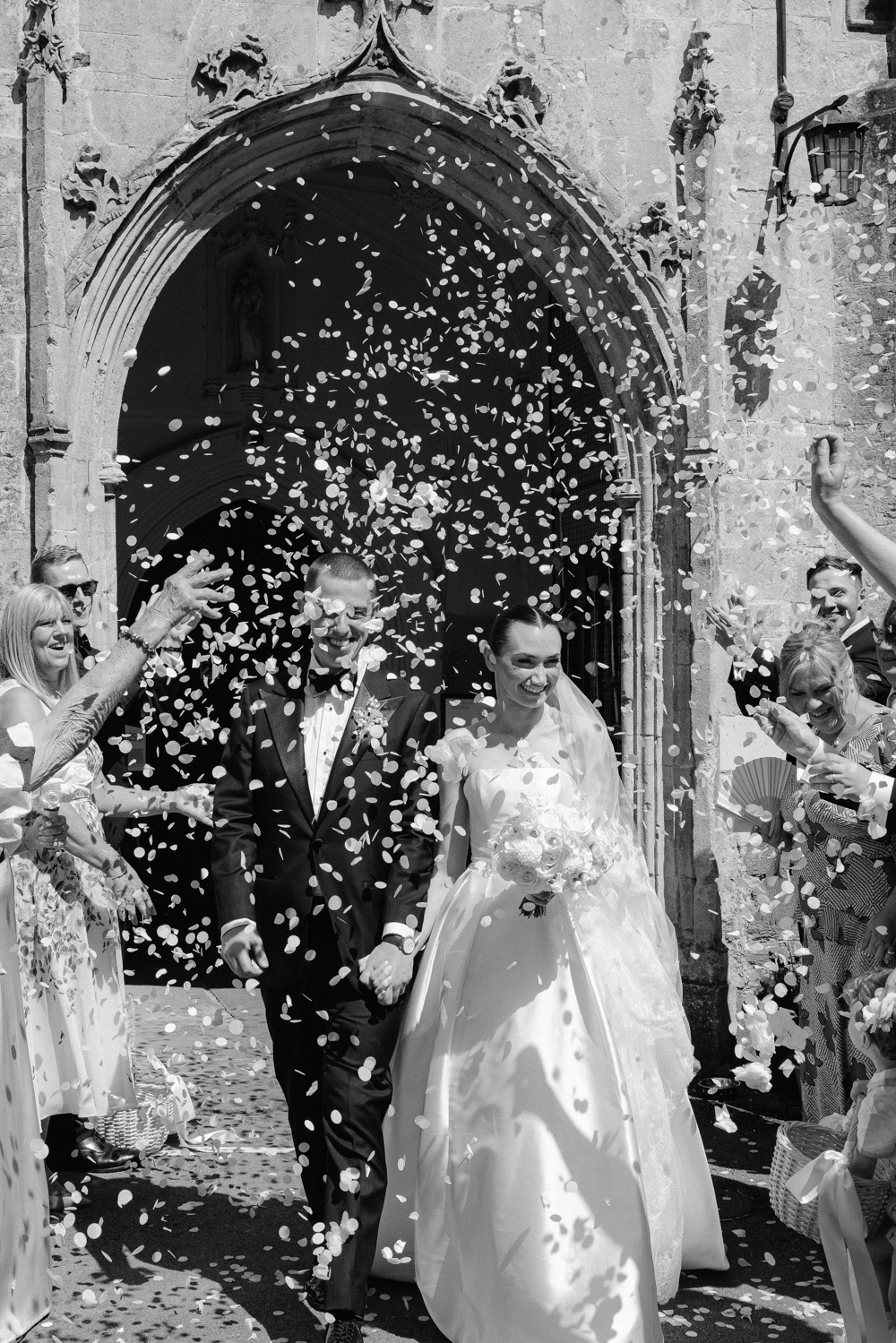 Llantilio House Wedding Photographer - Confetti outside USK Church