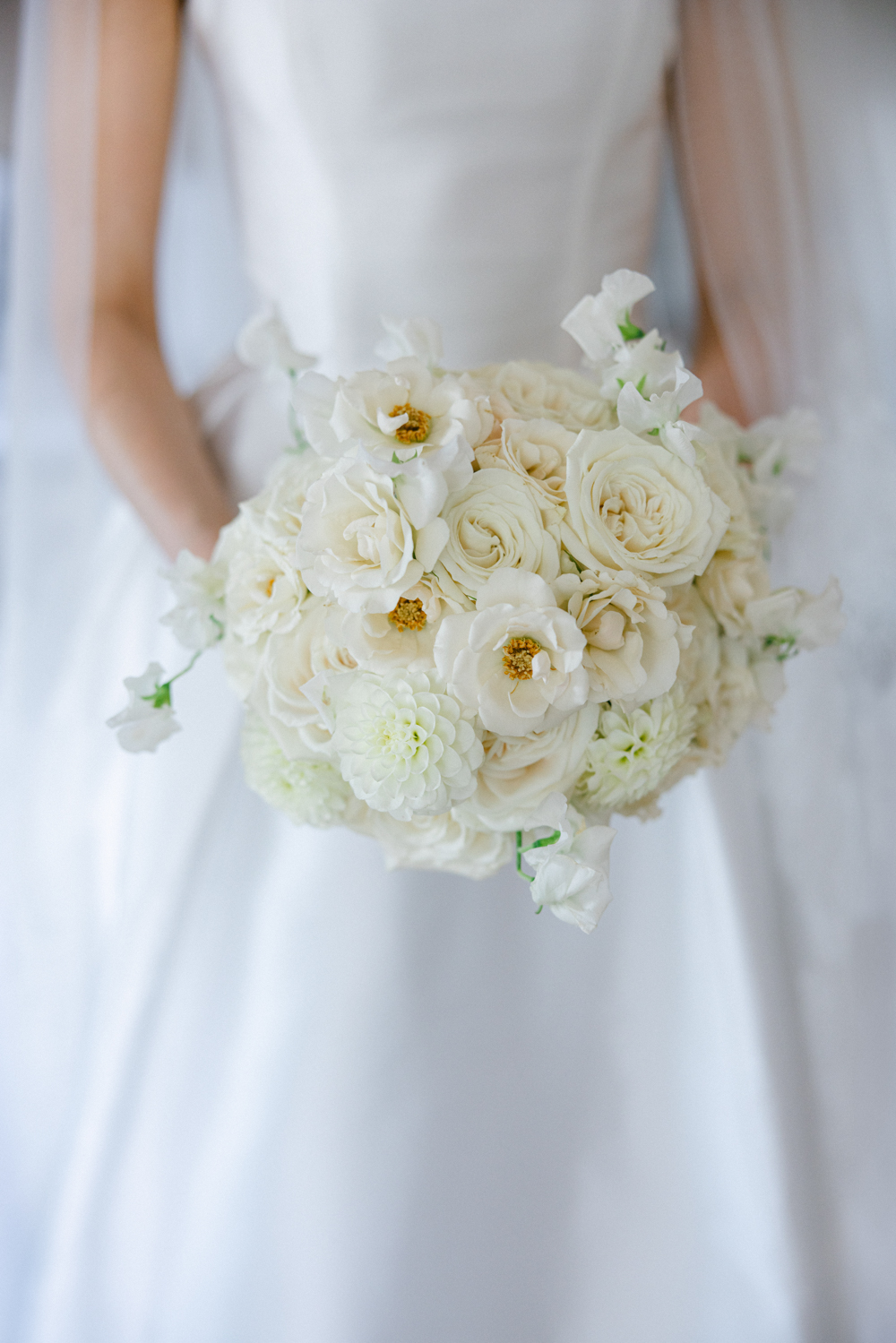 Llantilio House Wedding Photographer - Florals in brides hand