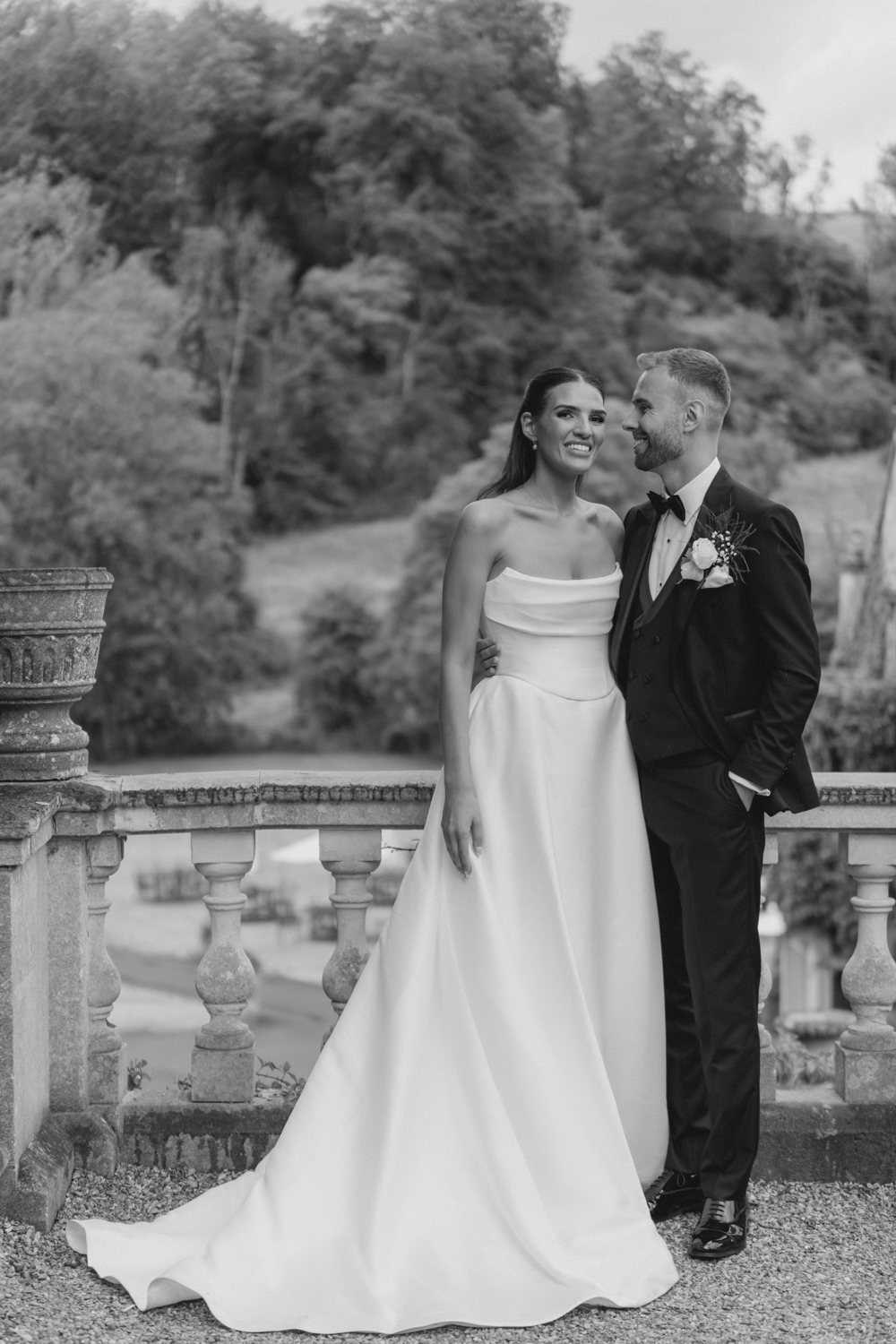 Bride and Groom on the Manor House Staircase in Castle Combe